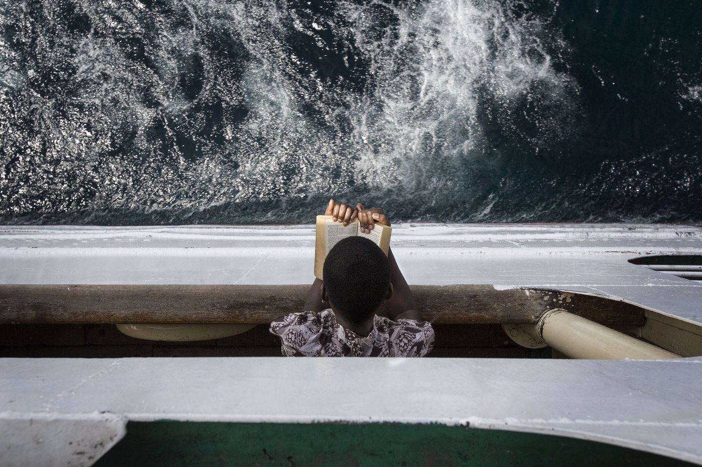 Reading on the boat